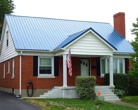 blue metal roof on red brick house|brick homes with metal roofs.